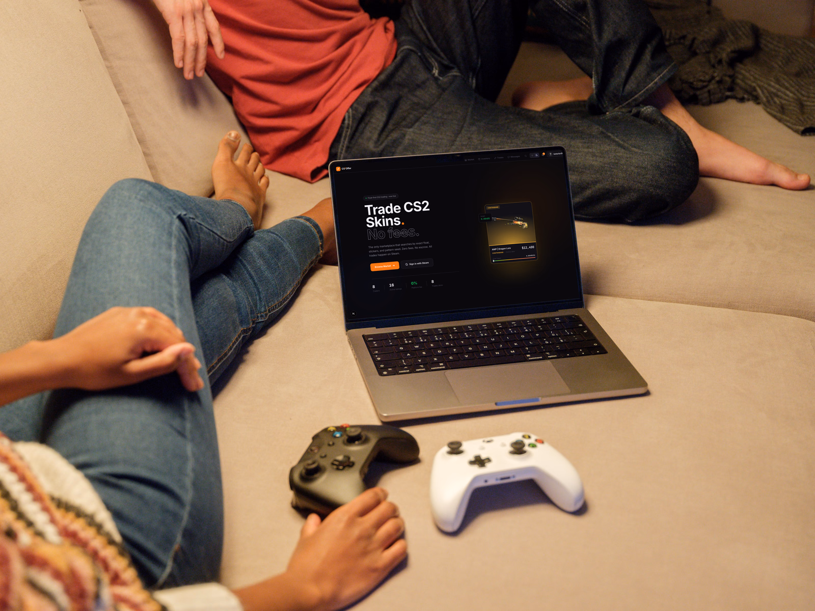 CS2Offer open on a laptop between two people with controllers